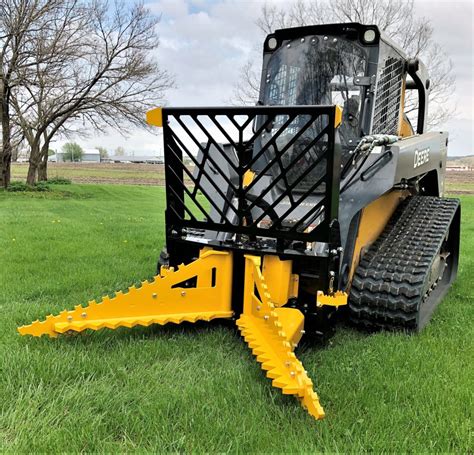 tree puller skid steer|tractor mounted tree puller.